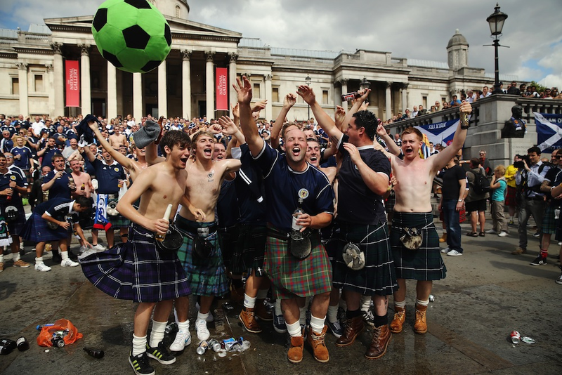 Illustration for article titled A Photo Tribute To Drunk Scottish Fans